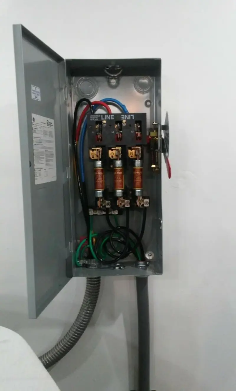 Three-phase disconnect switch installed for Smoke Detector Installation in Texas City
